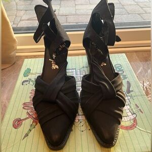 Free People size 40 color, black closed toe heel back zipper with buckle pins